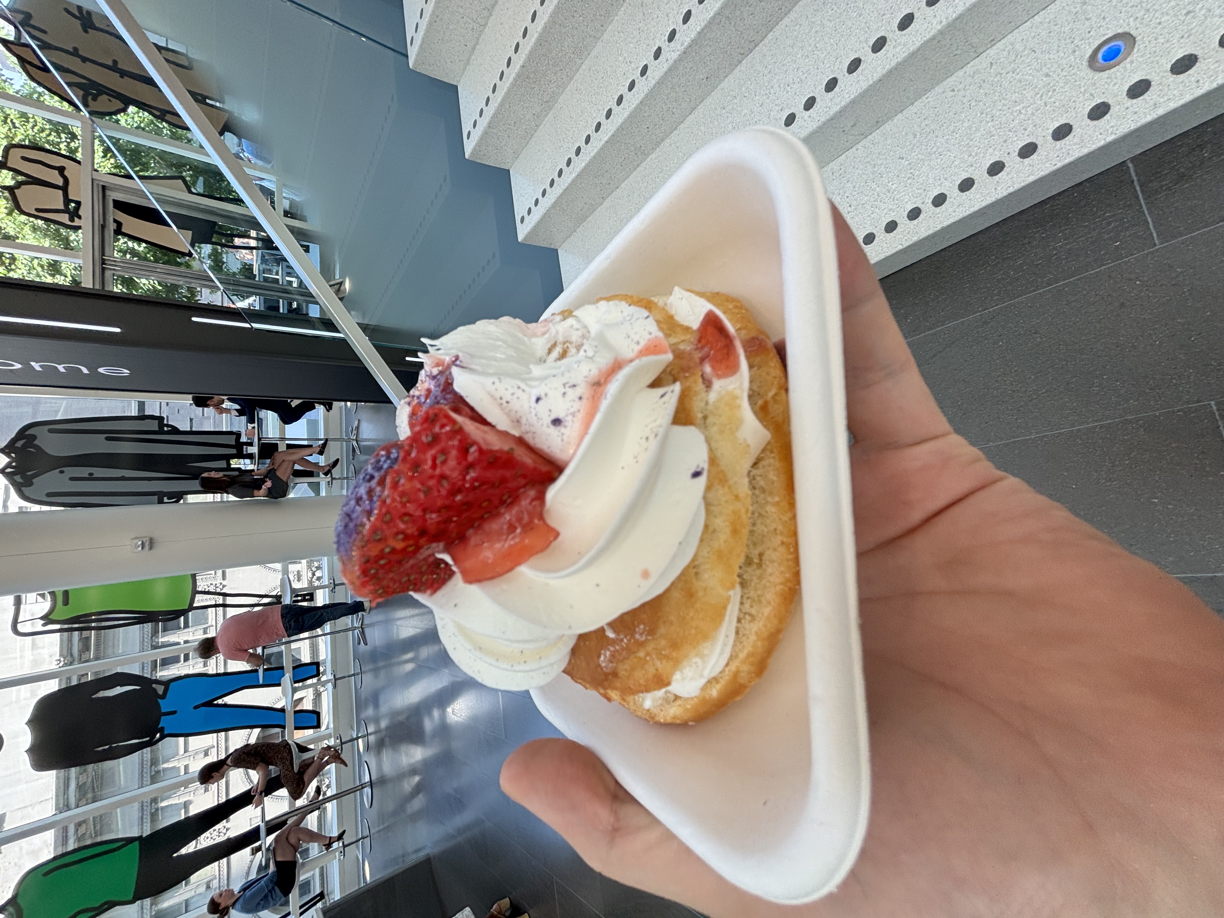 Paper plate of corporate croissant donut.